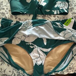 New with Tags. Swim By Cacique BOTTOM only. size 14. Cute Adjustable sides.